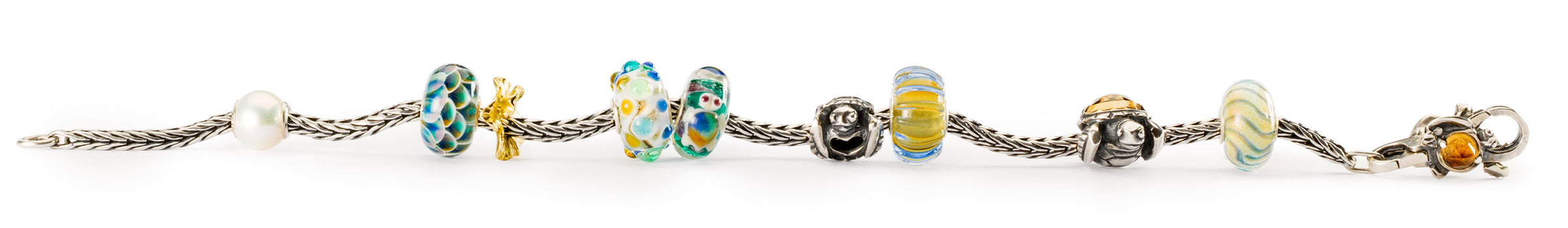 Trollbeads armbånd med skildpadde og hav tema inspireret kugler i glas og sølv